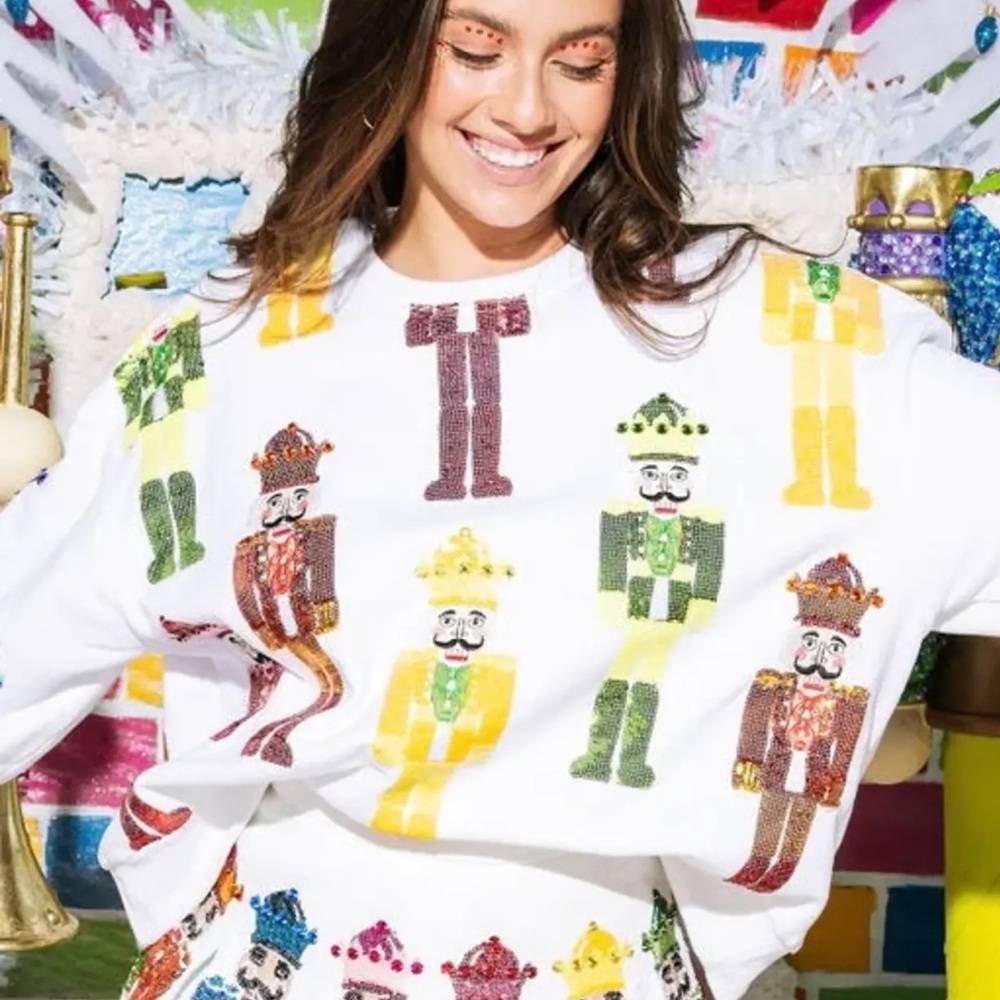 White and Rainbow Nutcracker Sweatshirt by Queen of Sparkles.